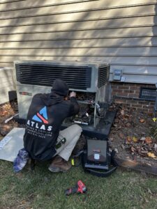 Atlas HVAC technician in the field on a service call in York County
